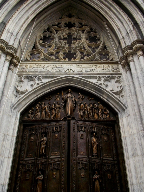 a church doorway with the name jesus on it