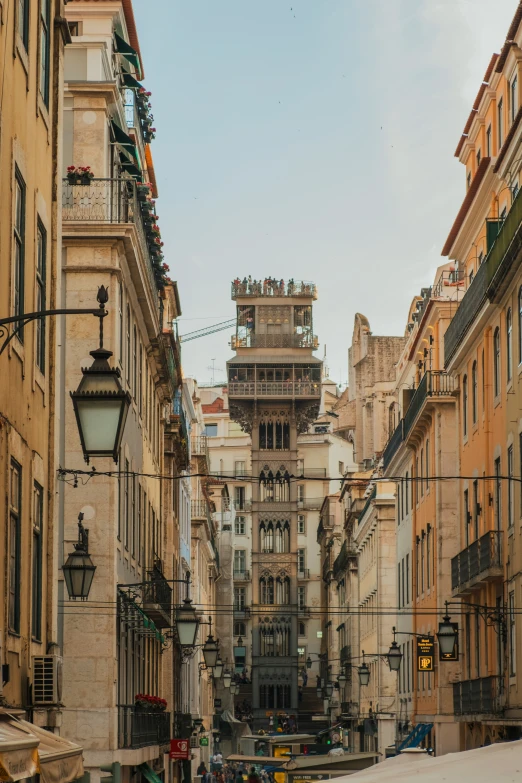 the building is built on the narrow street in the city