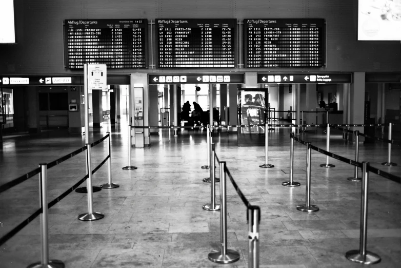 a view of an airport terminal with a person passing through