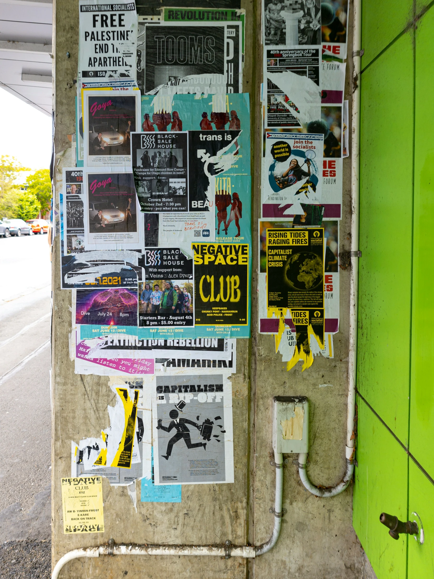 newspaper paper is attached to the wall with electric cords