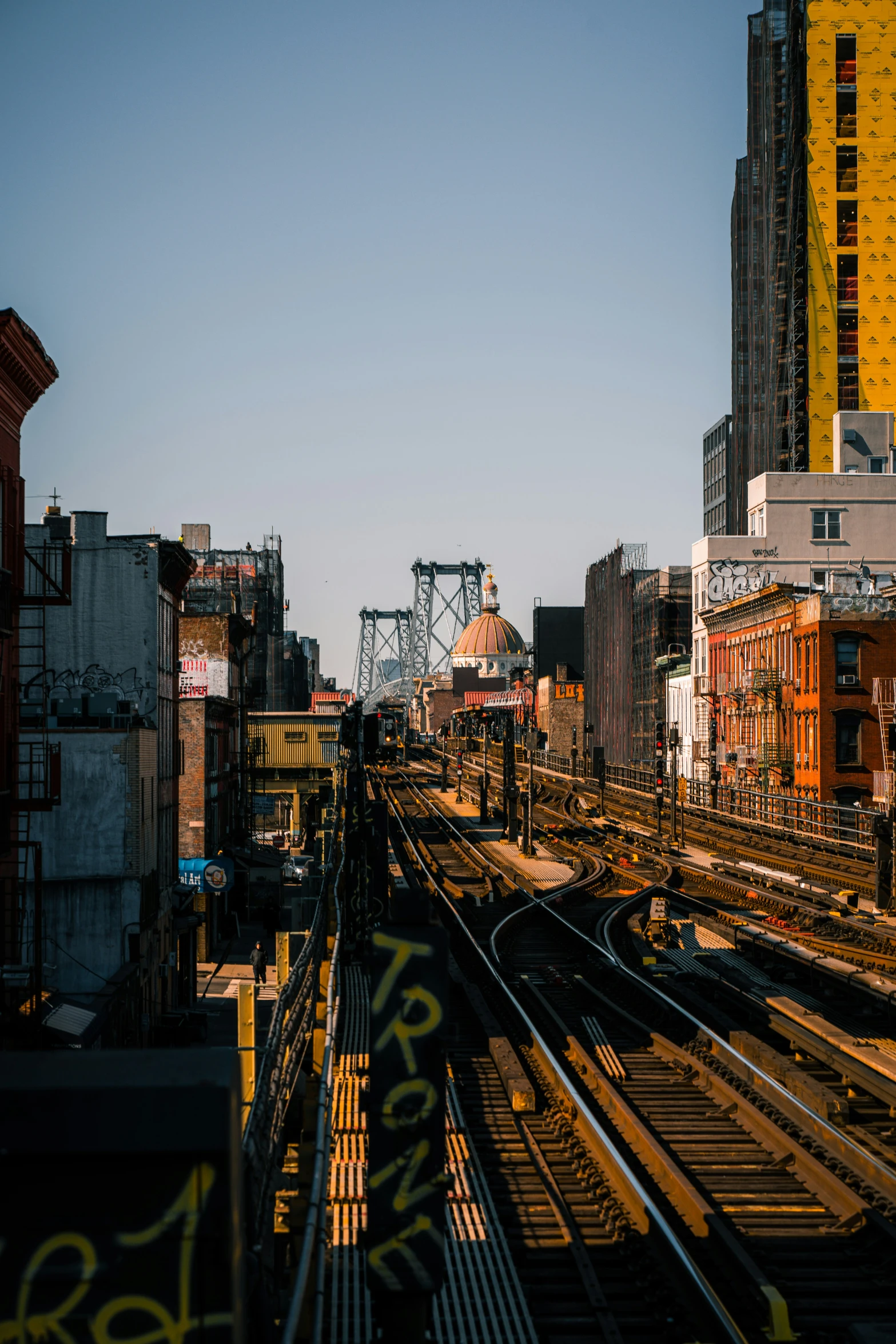 the tracks are in the middle of an urban area