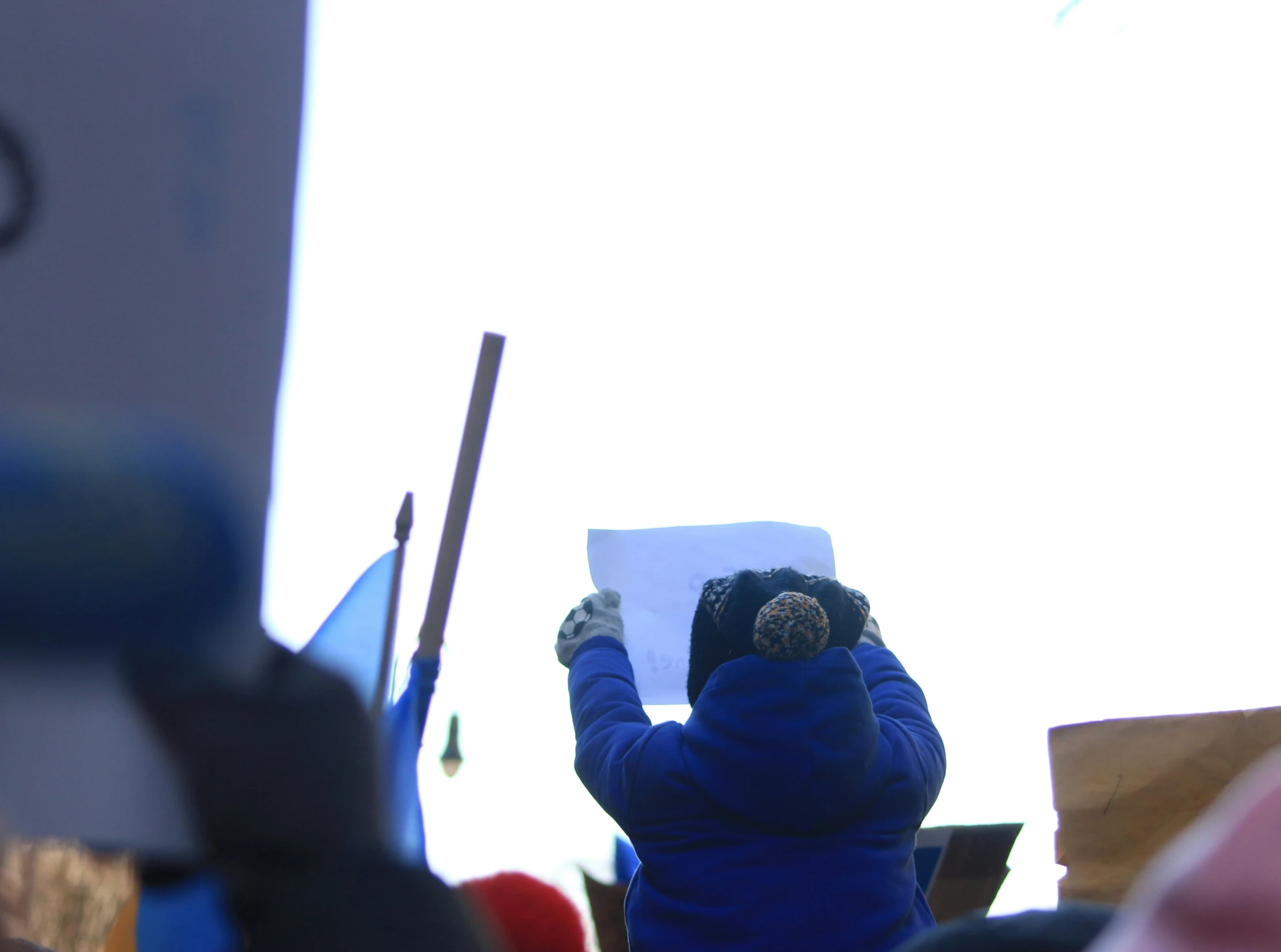 this is a po of people holding a sign