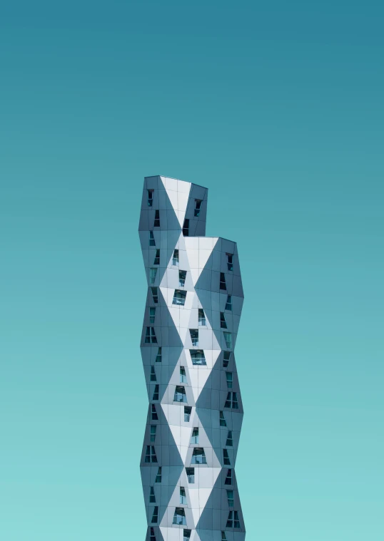 the abstract building stands alone against the blue sky