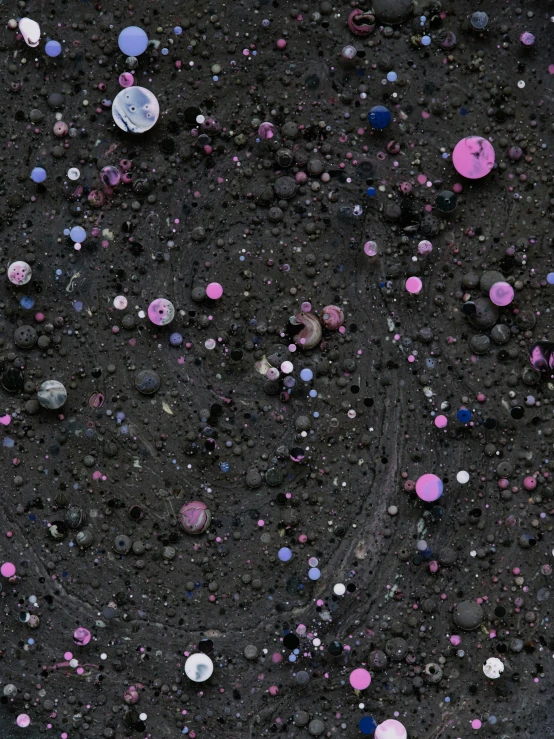 a group of items on the ground covered in lots of dots