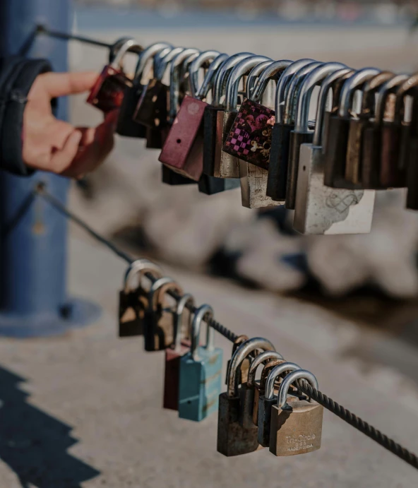 a close up of locks on a street