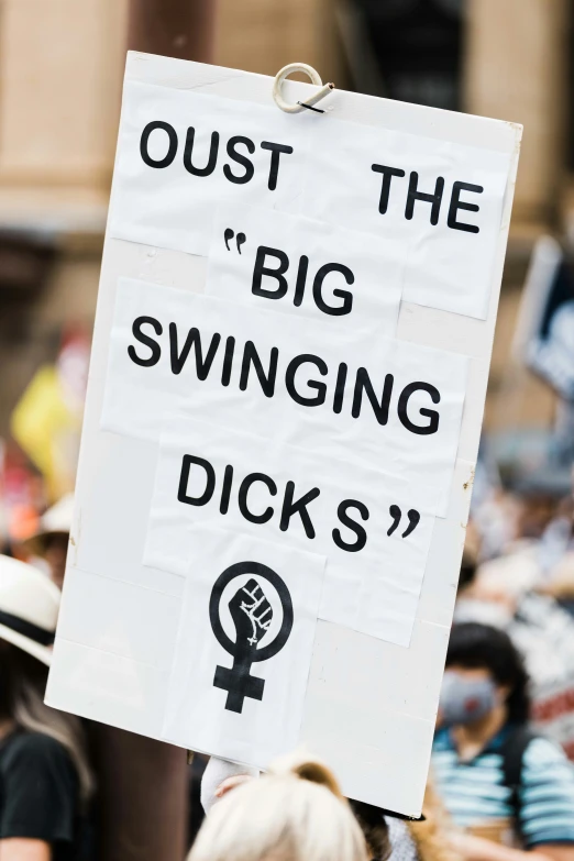 a white sign saying just the big swinging s with black writing on it