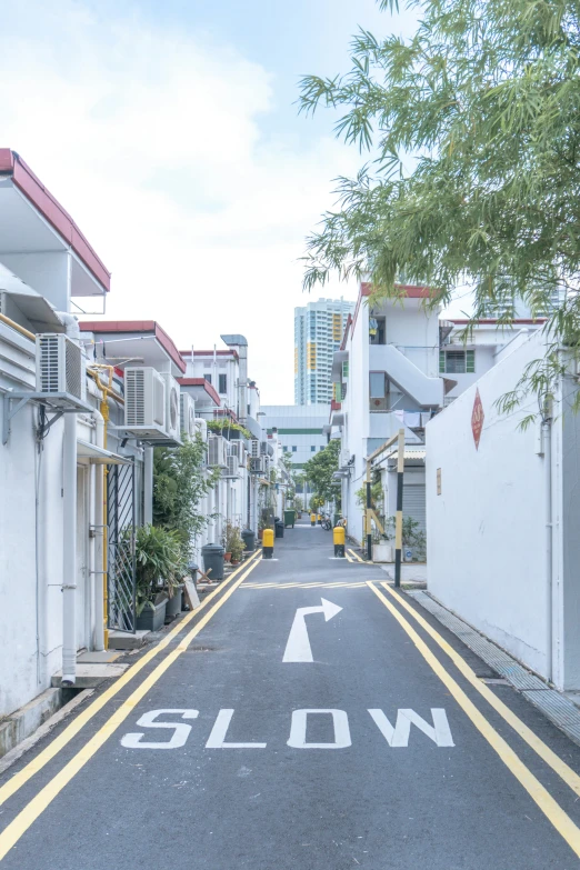 this is an alley that leads down to some residential buildings