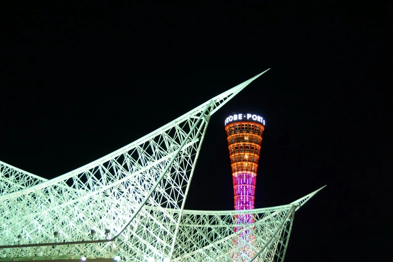 a tall tower that is lit up at night