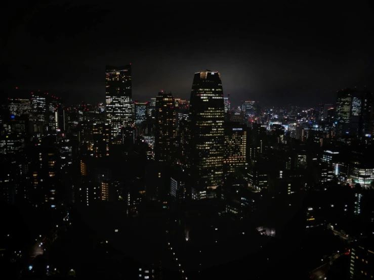 the city lights shine brightly at night