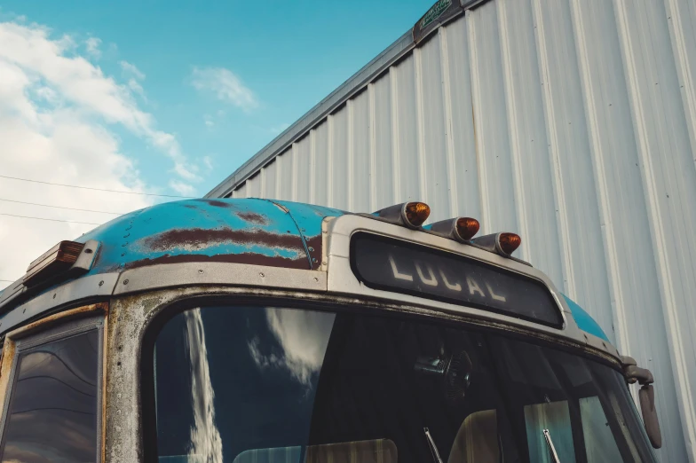 an old bus with the words luvvie painted on the side
