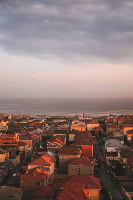 a beautiful view of a large city with brown roofs