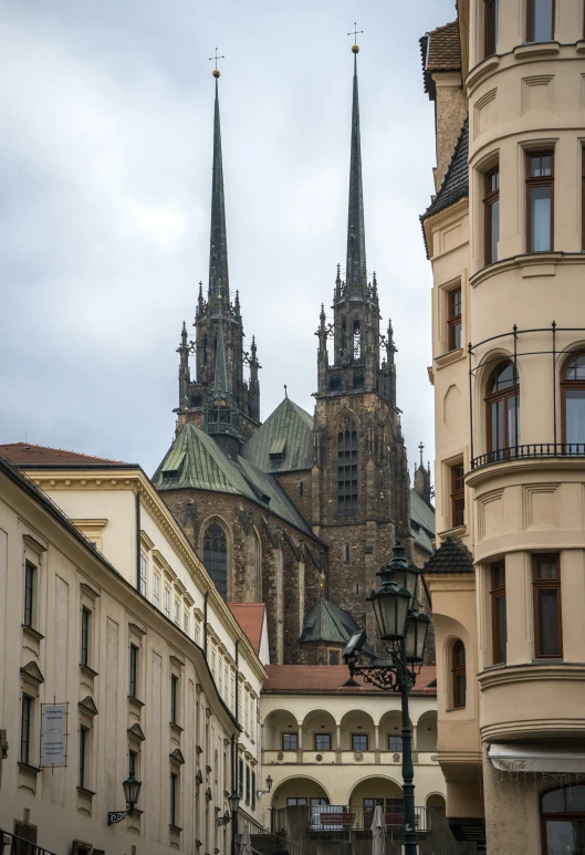 a cathedral in a large city surrounded by buildings