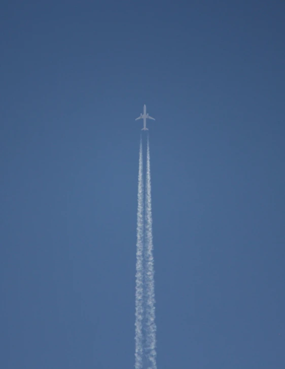 an airplane that is flying through the air