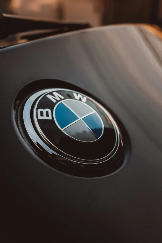 bmw emblem is shown on the side of a motorcycle