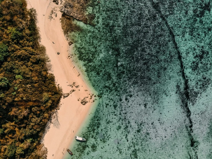 the aerial po shows clear water along the beach