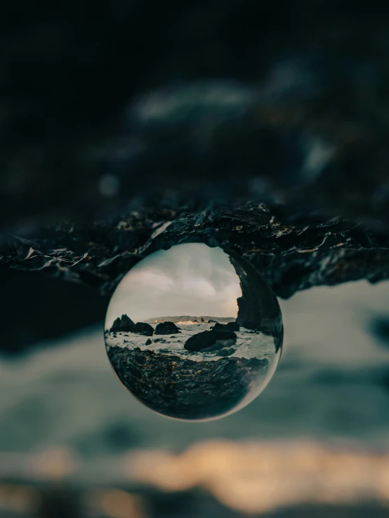 the reflection of a lake in a mirror