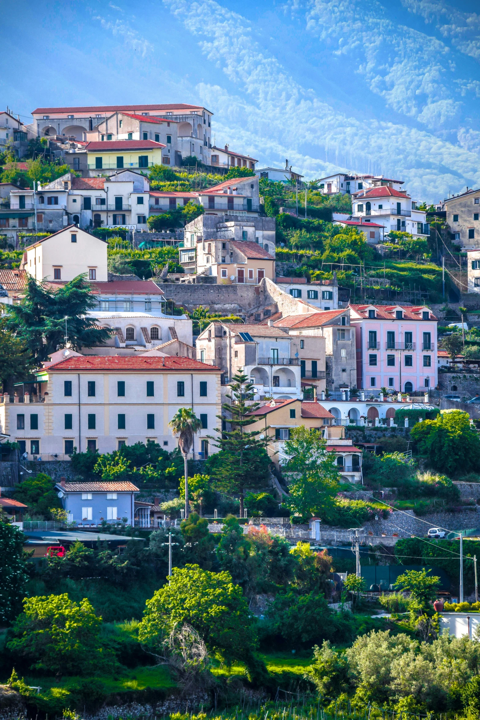 a small city is on top of a hill