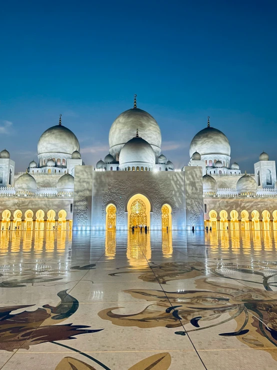 the main structure of the building is decorated in white with gold accents