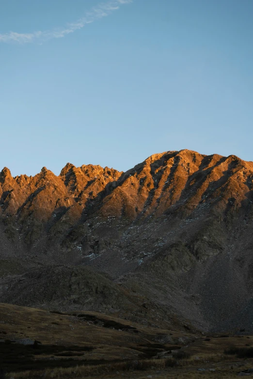 the mountain range during sunset on a clear day