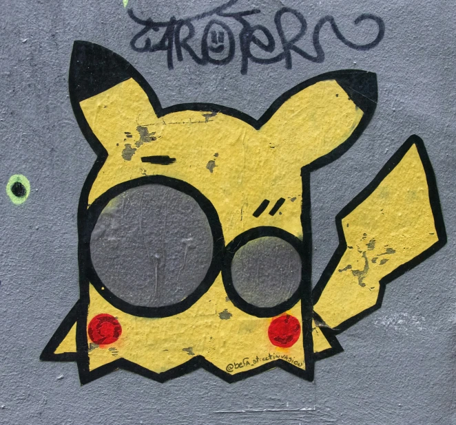 the pokemon pikachu face painted on the wall