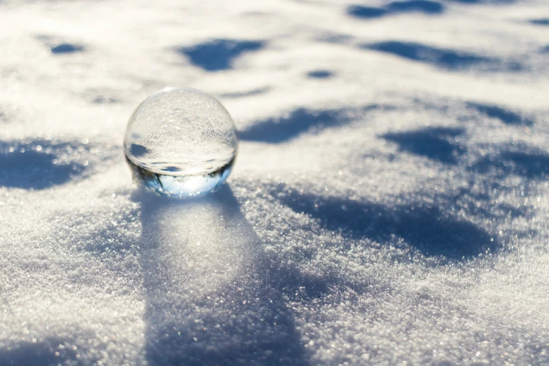 an object is on top of the snow