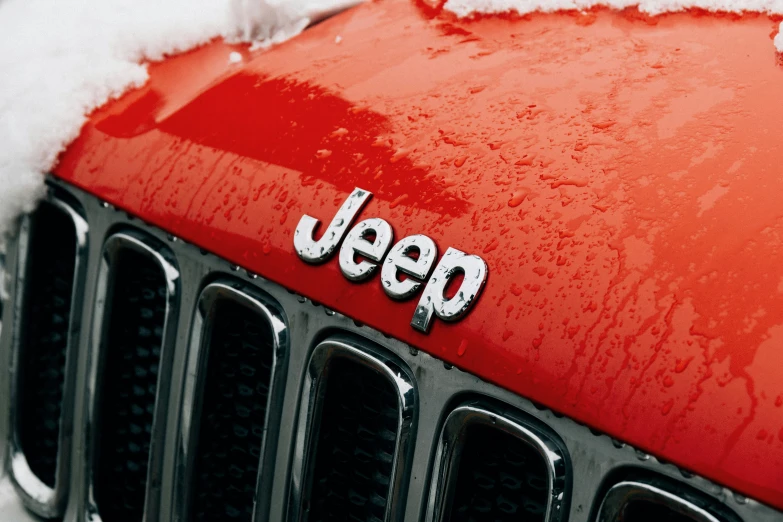 a jeep with a word jeep on the front grill