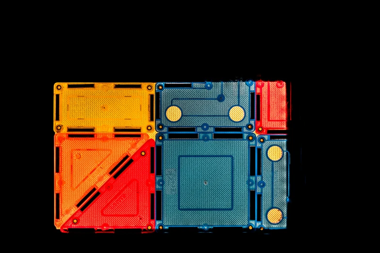 three pieces of electronic circuitry with colors