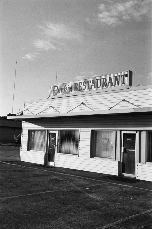 the exterior of an empty, run down restaurant