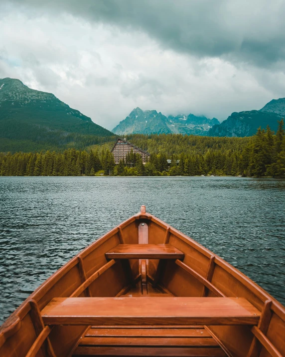 boat that is sitting at the end of the body of water