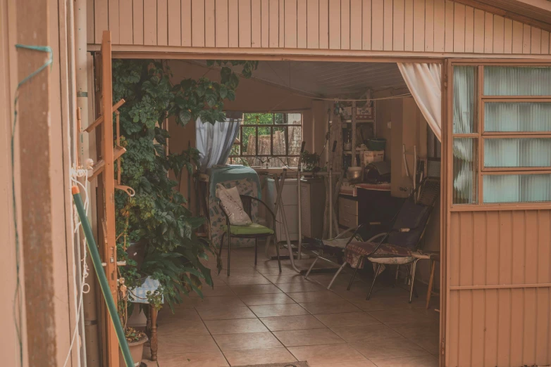 a patio is filled with furniture and flowers