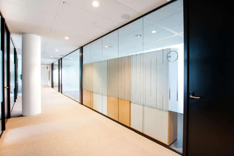 office hallway with glass walls and columns