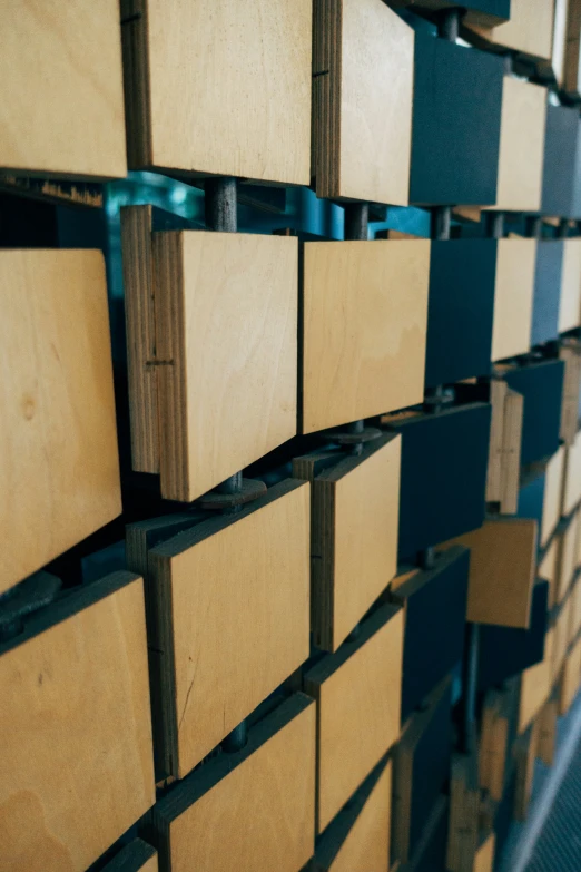 several stacks of wooden planks with blue markings