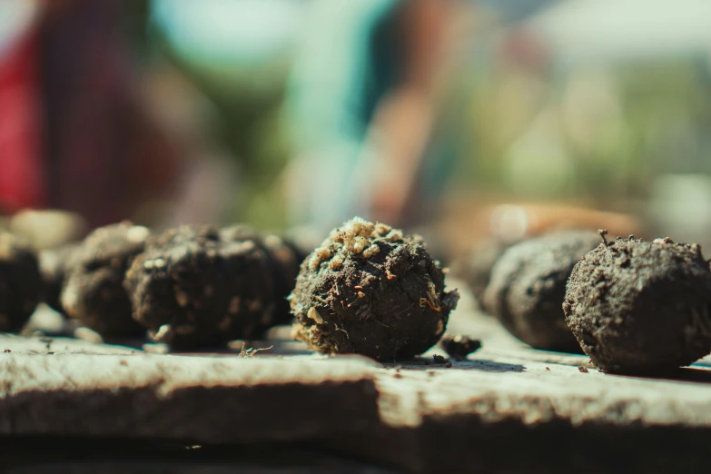 several balls of food on the table with other items