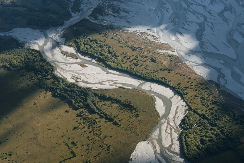 the view from an airplane on a snowy mountain