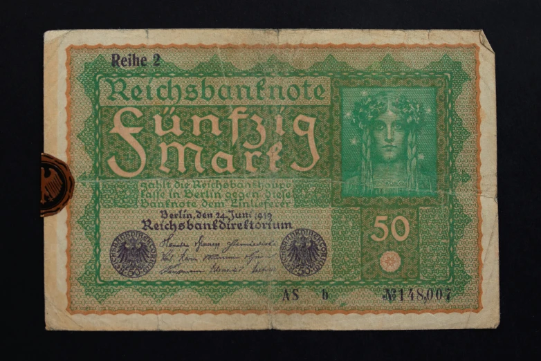 a green german money note with the words suning smart on it