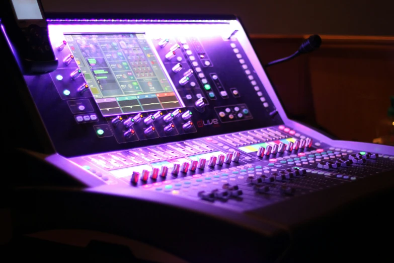 the control panel of an audio mixing console