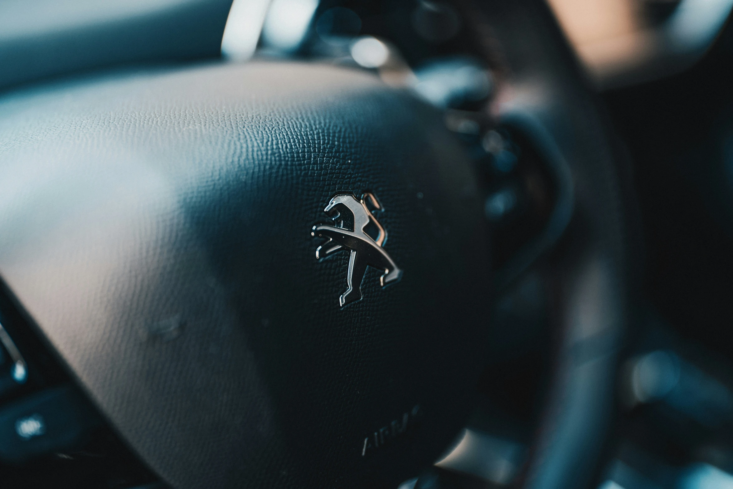 dashboard and steering wheel of a car with a steering wheel and dash wheel