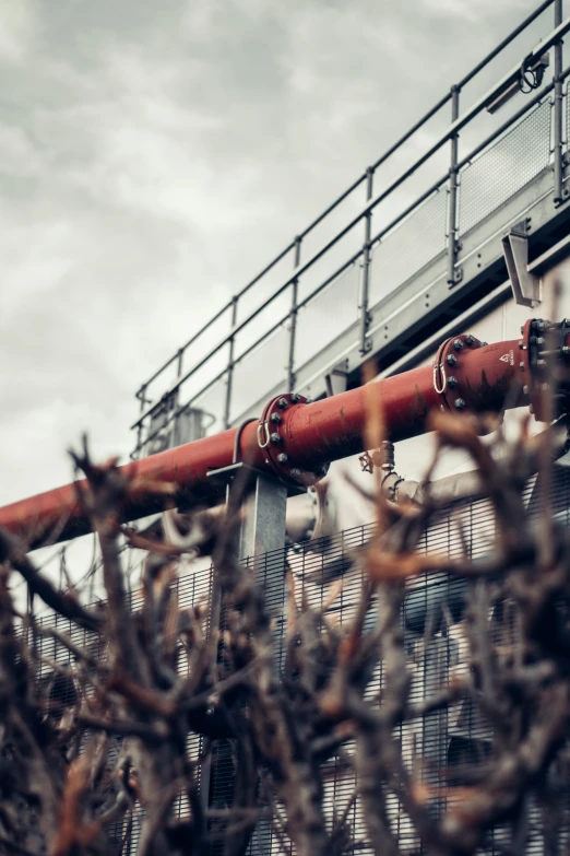 a group of pipes attached to an industrial pipe