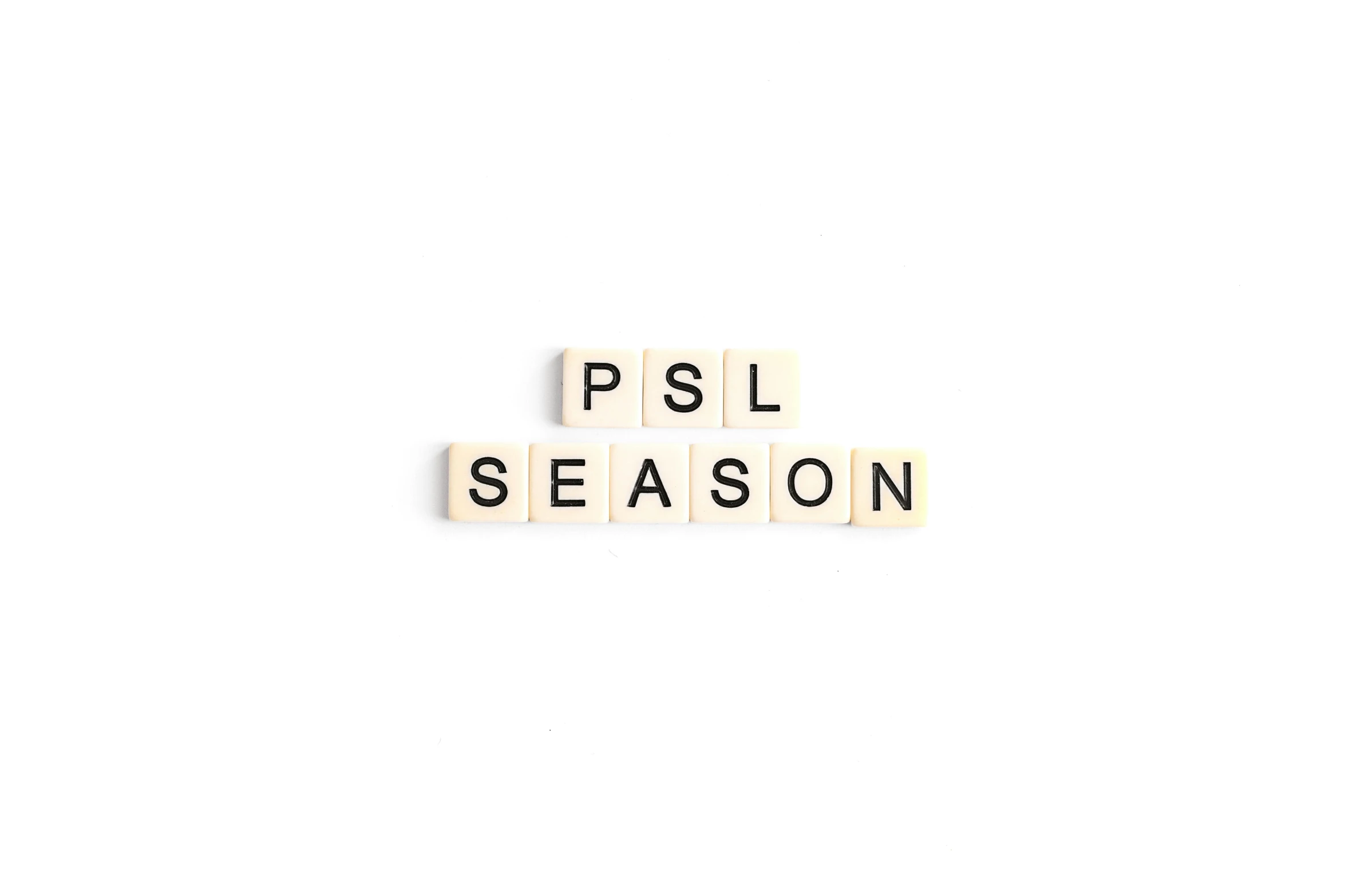 scrabble type letter tiles spelling the word psl season