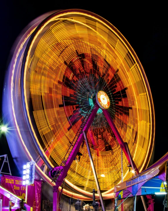 a big wheel at night on the carnival