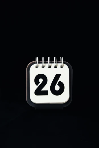 a black and white calendar with the number twenty six