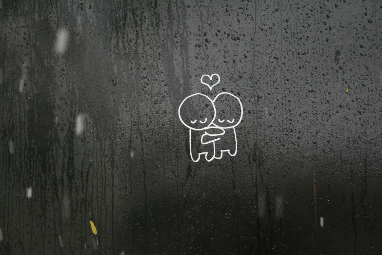 a couple kissing on a rainy day with the window showing
