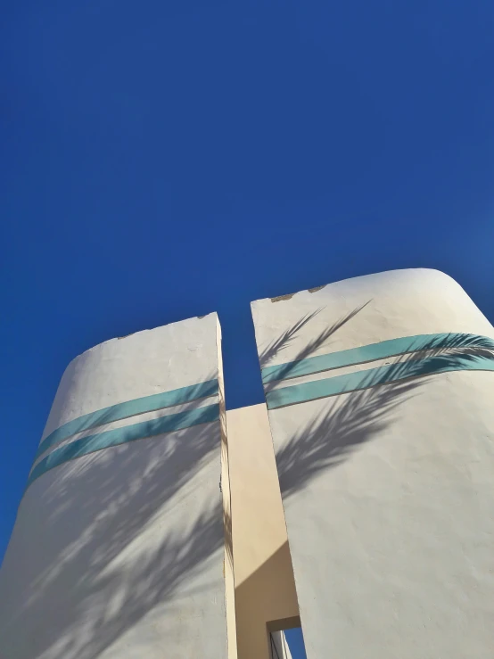 an arch with blue sky in the background