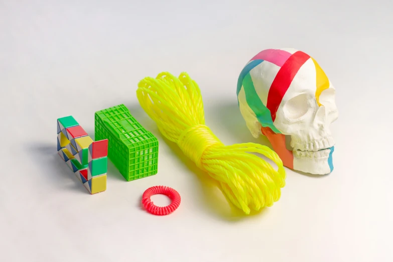 a toy skull, a set of toys, and one in the foreground
