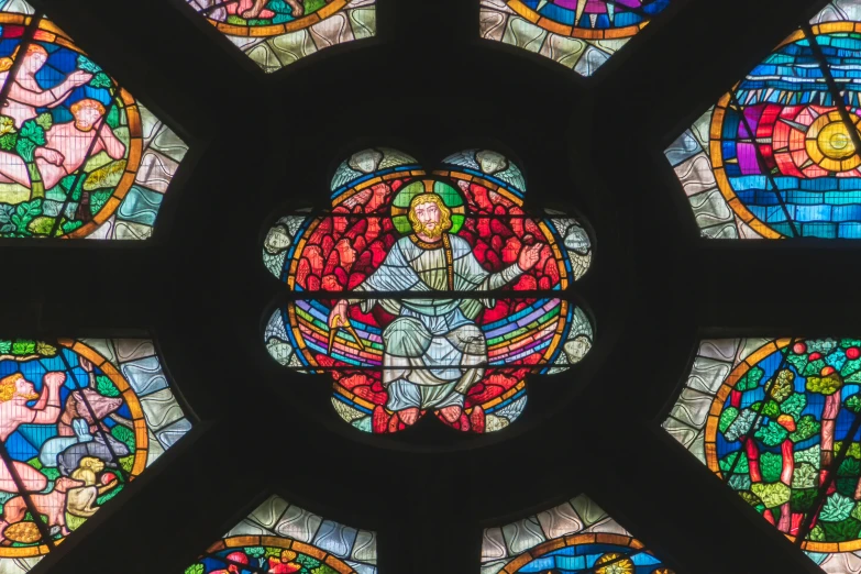 the stain glass design in the inside of a building