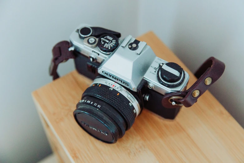 a camera that is on top of some wooden