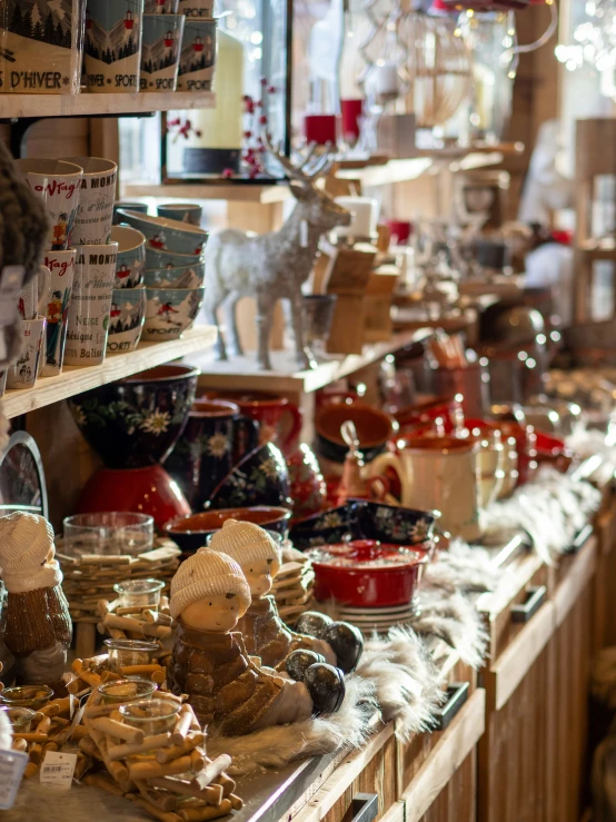 a store filled with wooden shelves and lots of glass