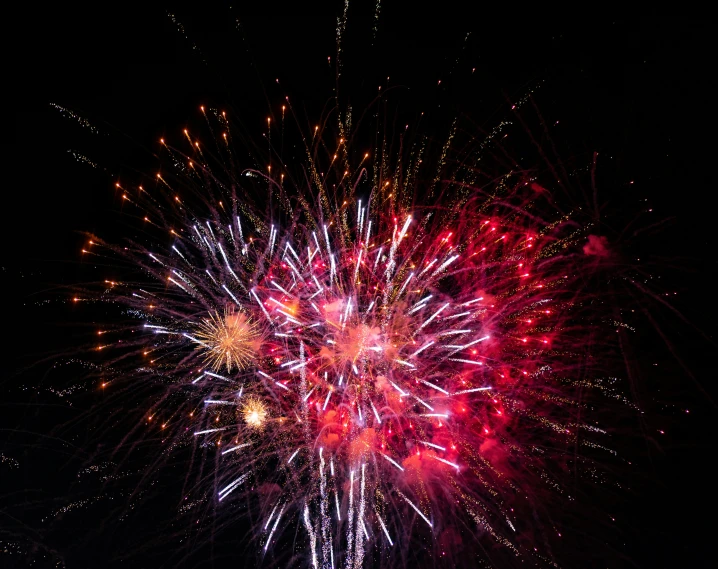 a firework display at night with stars and light