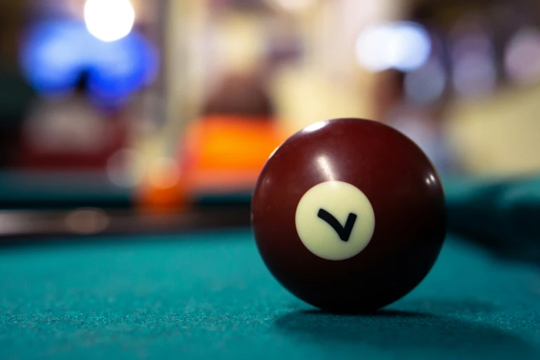 a billiard's ball is displayed on the pool table