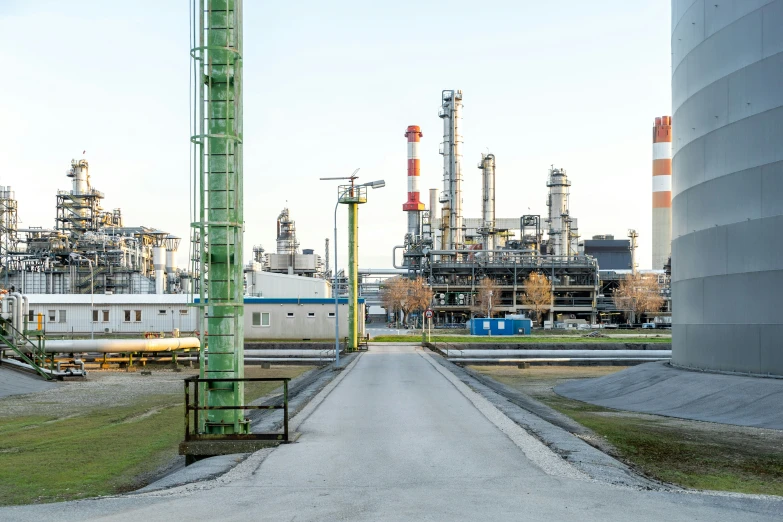 an oil refinery on the outskirts of a large factory